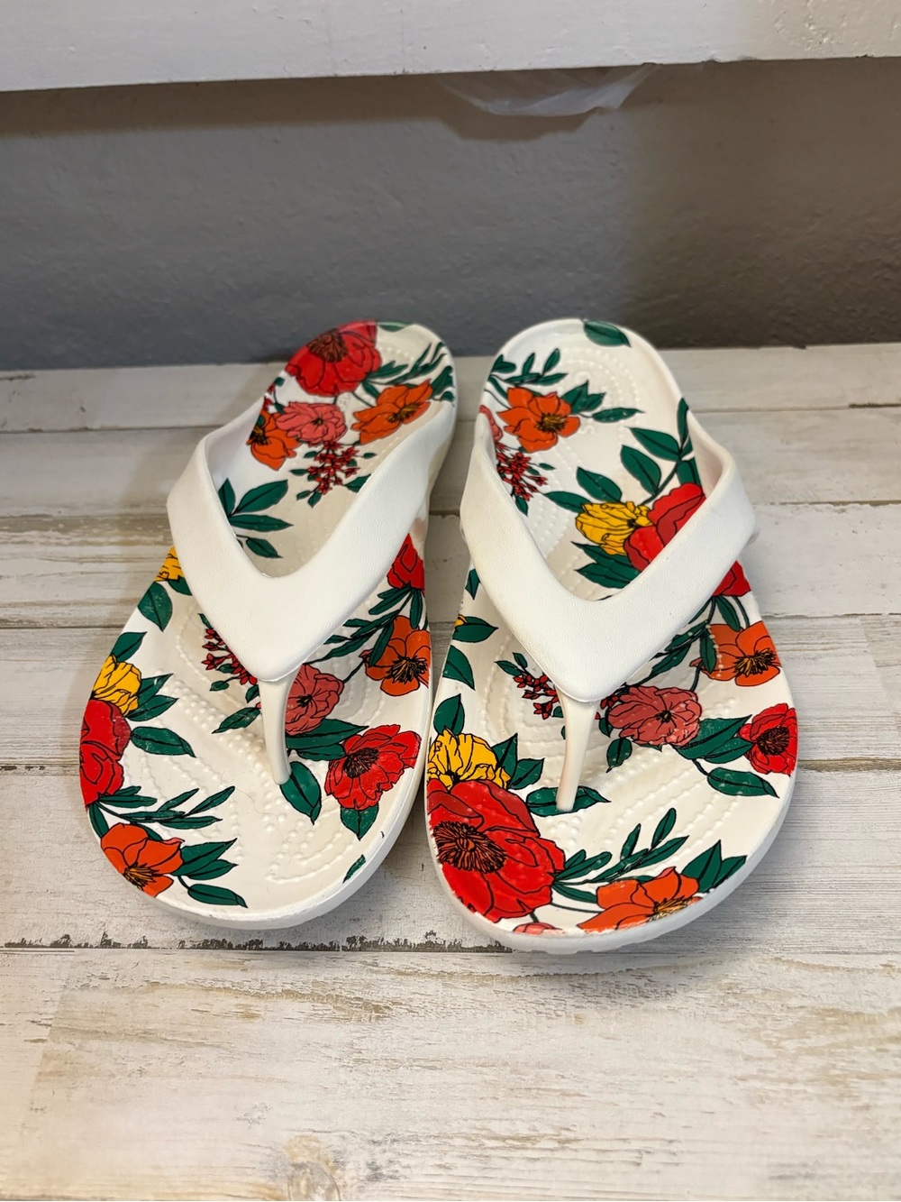 CROCS Floral White Flip Flop Sandals with Red, Orange & Yellow Flowers